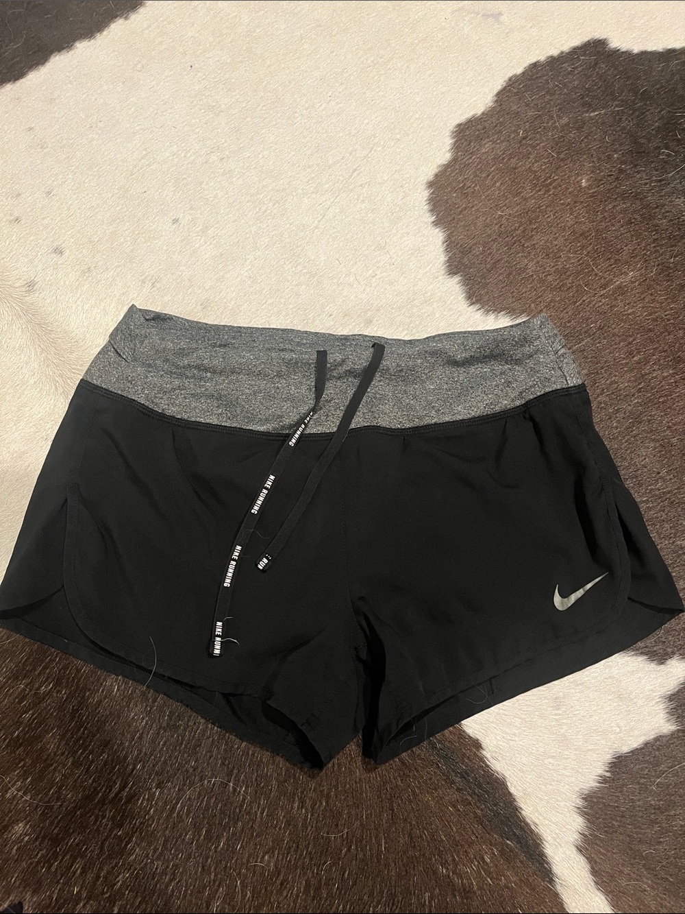 Nike Women's Black Athletic Shorts with Gray Waistband and Reflective Swoosh